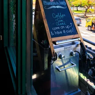 Sign outside the door.