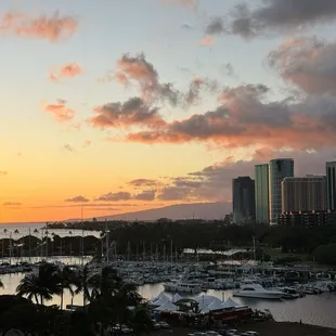 View from a few stories up. The bartender was so cool, he told me to go up the elevator for a quick shot of the sunset