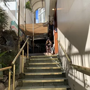 the stairs leading to the restaurant