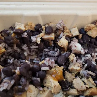 I ordered a bowl with chicken, rice, beans, lettuce, onions, cilantro, jalapeños, and salsa fresca.