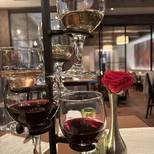 three glasses of wine on a table