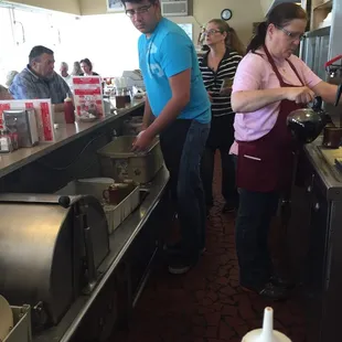 Kitchen staff hard at work on a busy Saturday morning.