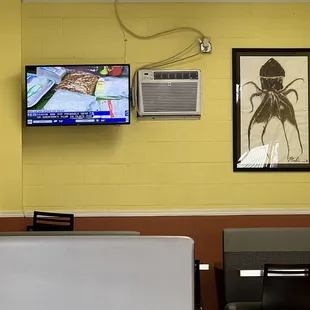 a television mounted on the wall