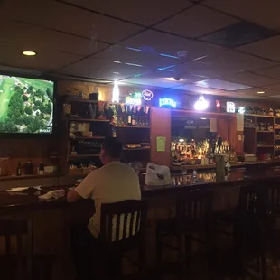 Two 65&quot; TVs behind bar with ESPN sports package and 6 more 55&quot; TVs surrounding pool tables!