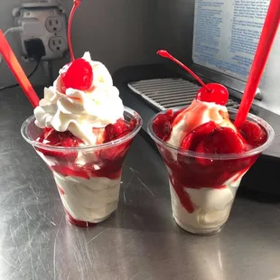 Strawberry Sundae's. One with Whip Cream and one without.