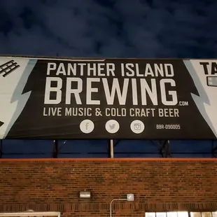 a sign on the roof of a building