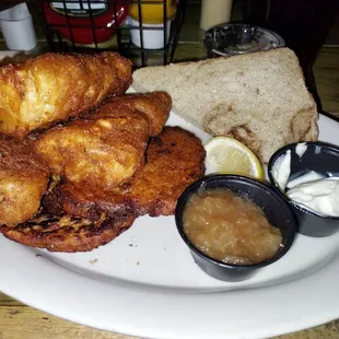 Cod fish fry with potato pancakes.