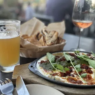 Charred queso Oaxaca so delicious with your favorite drink.