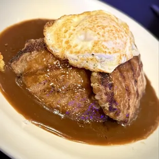 LOCO MOCO w/ a grilled portobello mushroom,L two angus beef patties, brown gravy &amp; an over easy egg $30