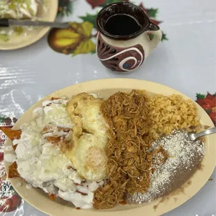 The Pansanstor, Chilaquiles, Two Eggs, Tinga, Rice and Beans, in platillo extraordinario.
