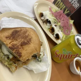 Torta, taquitos and a drink.