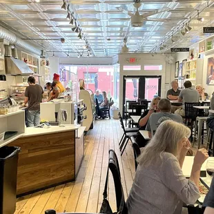 a busy restaurant with customers