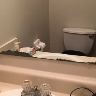 The mirror edges in the half bath