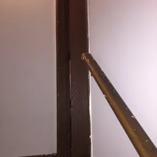 Railings and trim coming up from the basement.