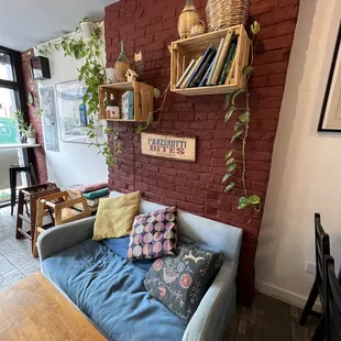 a living room with a couch and a table