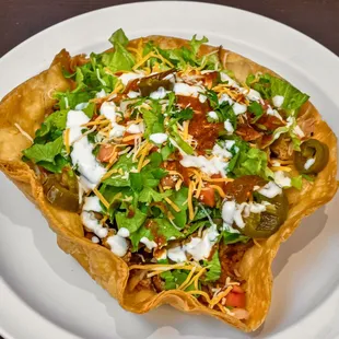 Panzon Super Tostada with extra jalapeños