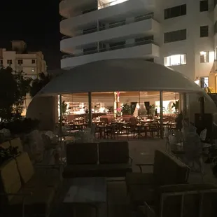 The outside veranda overlooking the pool area is quite glamorous