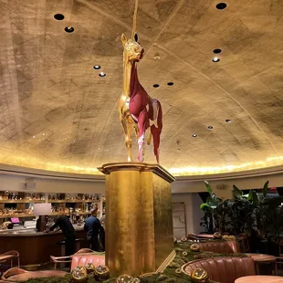 a horse statue in a restaurant