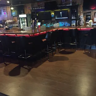 a bar with red lights