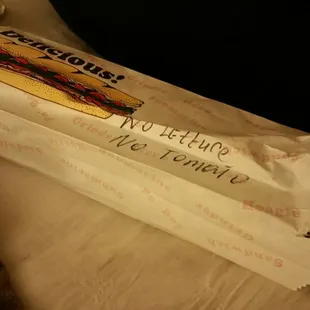 a wrapper with a hot dog on it