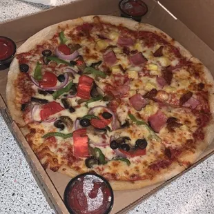 a pizza in a pizza box