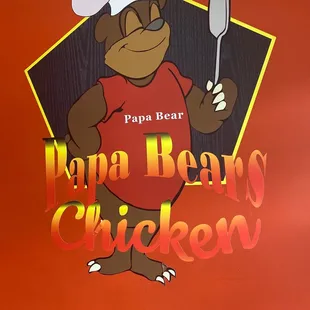 papa bear holding a spatula