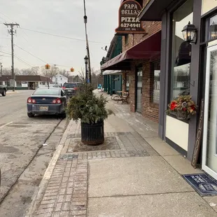 a car parked on the sidewalk