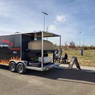 a food truck parked in a parking lot
