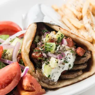 a pita sandwich and french fries