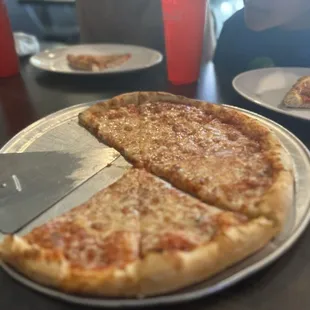 a slice of pizza on a plate