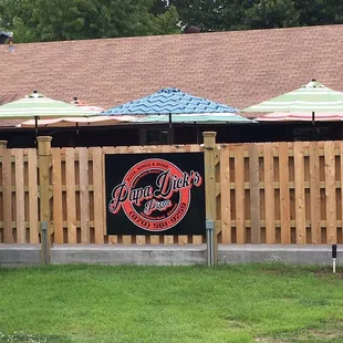 Ivory Lane view of Papa Dick's Pizza sports patio