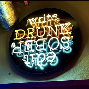 a neon sign that says white drunk