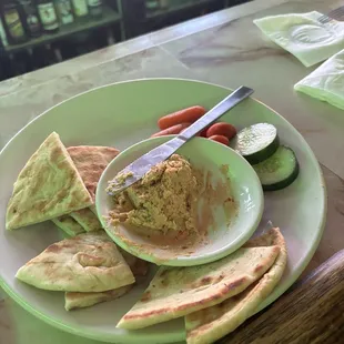 Half eaten haha hummus appetizer