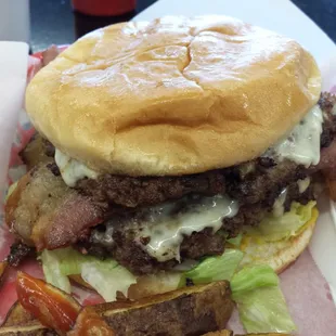 Chiara burger with bacon and cheese, it's the kind of burger you need a nap afterward.