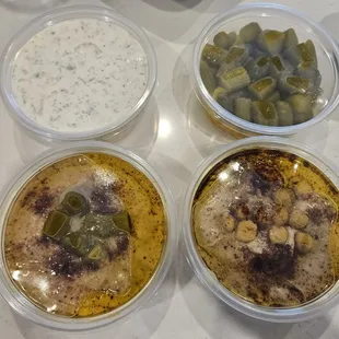 tzaziki hummus, baba ganoush, and pickles from Mixed Kebab Family Meal