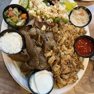 Rice Plater with Gyro and chicken Shawarma with side Greek Salad