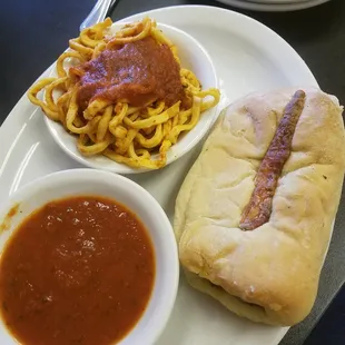 Hot sausage, provolone, and jalapeno cannoli sandwich with sauce for dipping, spaghetti on the side