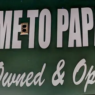 Sign above front counter.