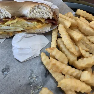 Bacon Egg Cheese w/mayo on a plain bagel with French fries