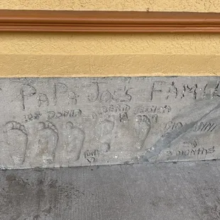 Papa Joe's Family History is cemented at the entrance