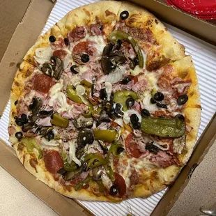 Papa Joes Special - Pepperoni, sausage, ham, anchovies, fresh mushrooms, roasted onions, roasted peppers, black olives. $18.95