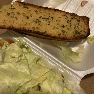 a piece of bread and lettuce