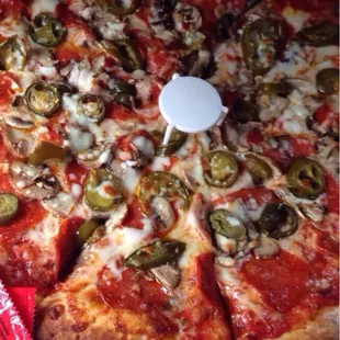 Pepperoni, mushroom, and jalapeño medium pizza.