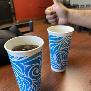 two cups of coffee on a table
