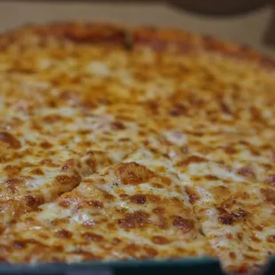 a cheese pizza in a box