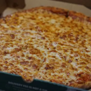 a cheese pizza in a box