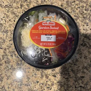 Expired salad, packaging is bloated