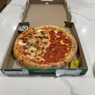 Cheese Stuffed Crust Half Pepperoni and Italian Sausage Pizza.