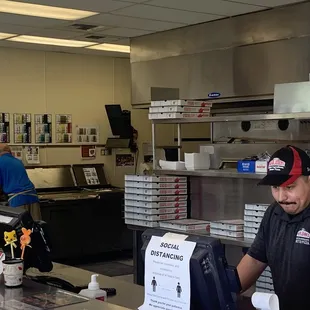 The cashier did not say a word probably not given any protective gear. Poor guy.... I felt bad for him.