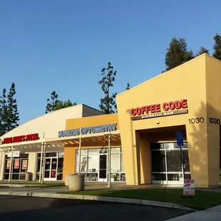 Papa John's Pizza and the neighrbors.